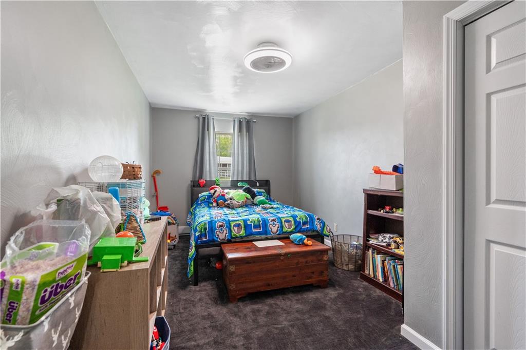 2109 Ridge Boulevard Connellsville, PA 15425 - Photo 13 of 22 a room filled with furniture and toys