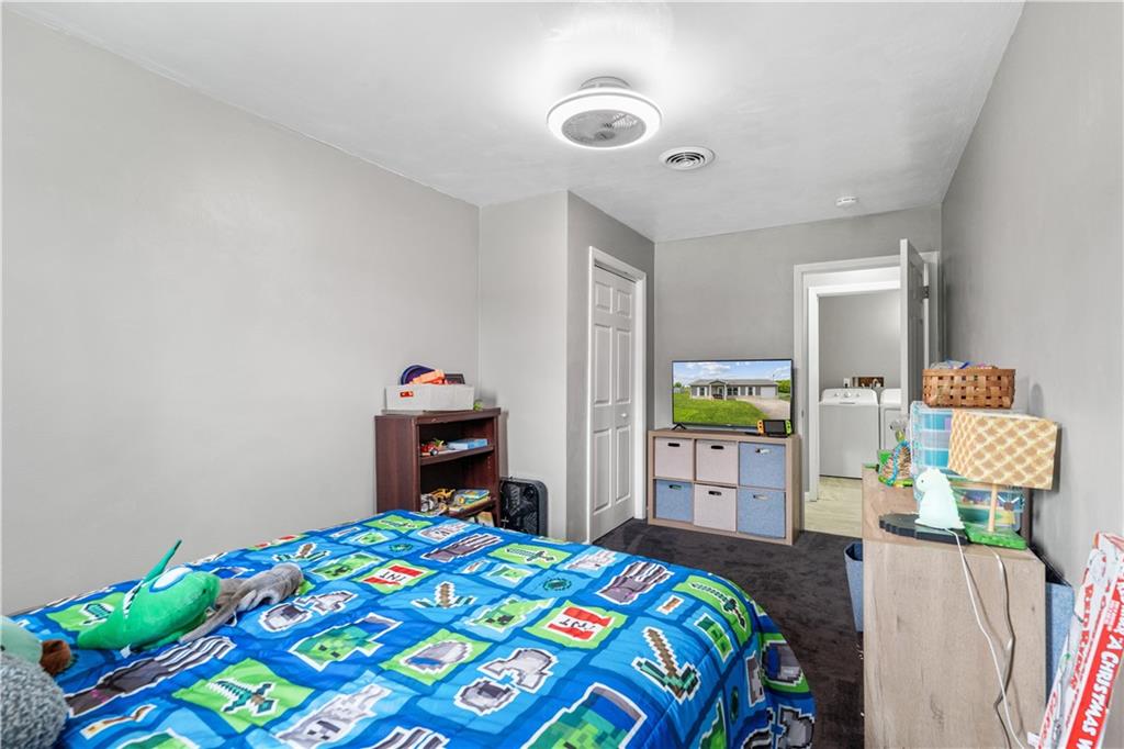 2109 Ridge Boulevard Connellsville, PA 15425 - Photo 14 of 22 a bedroom with bed and window