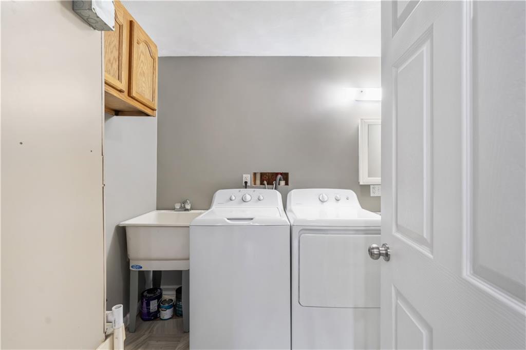 2109 Ridge Boulevard Connellsville, PA 15425 - Photo 16 of 22 a utility room with dryer and washer
