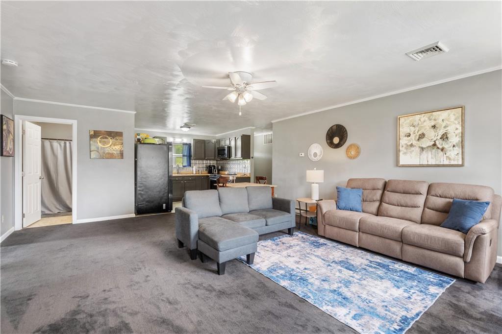 2109 Ridge Boulevard Connellsville, PA 15425 - Photo 3 of 22 a living room with furniture and a large window