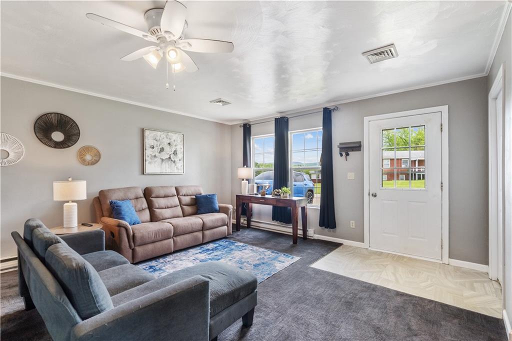 2109 Ridge Boulevard Connellsville, PA 15425 - Photo 4 of 22 a living room with furniture and a window