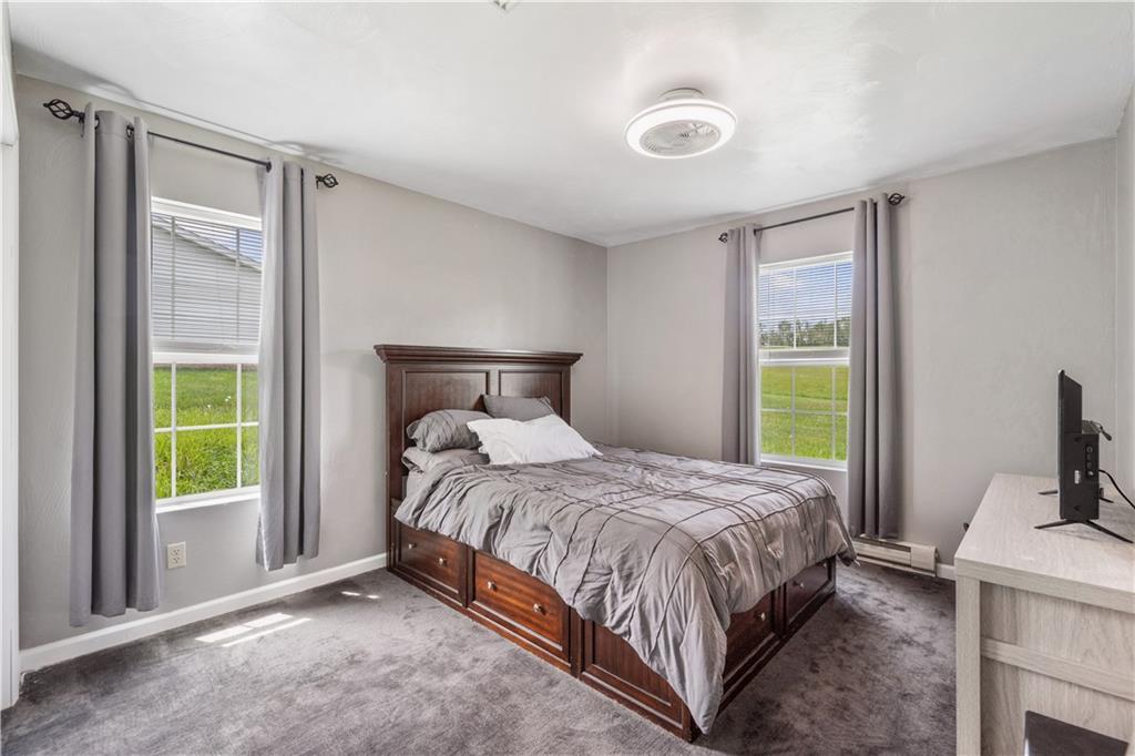 2109 Ridge Boulevard Connellsville, PA 15425 - Photo 9 of 22 a bedroom with a bed and a window