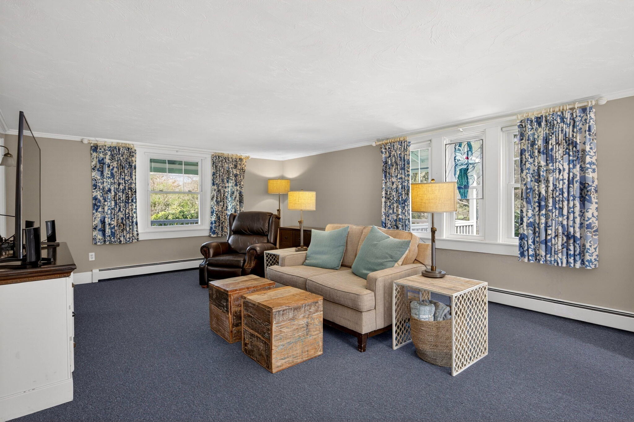 69 County Road Bourne, MA 02532 - Photo 17 of 54 a living room with furniture and a flat screen tv