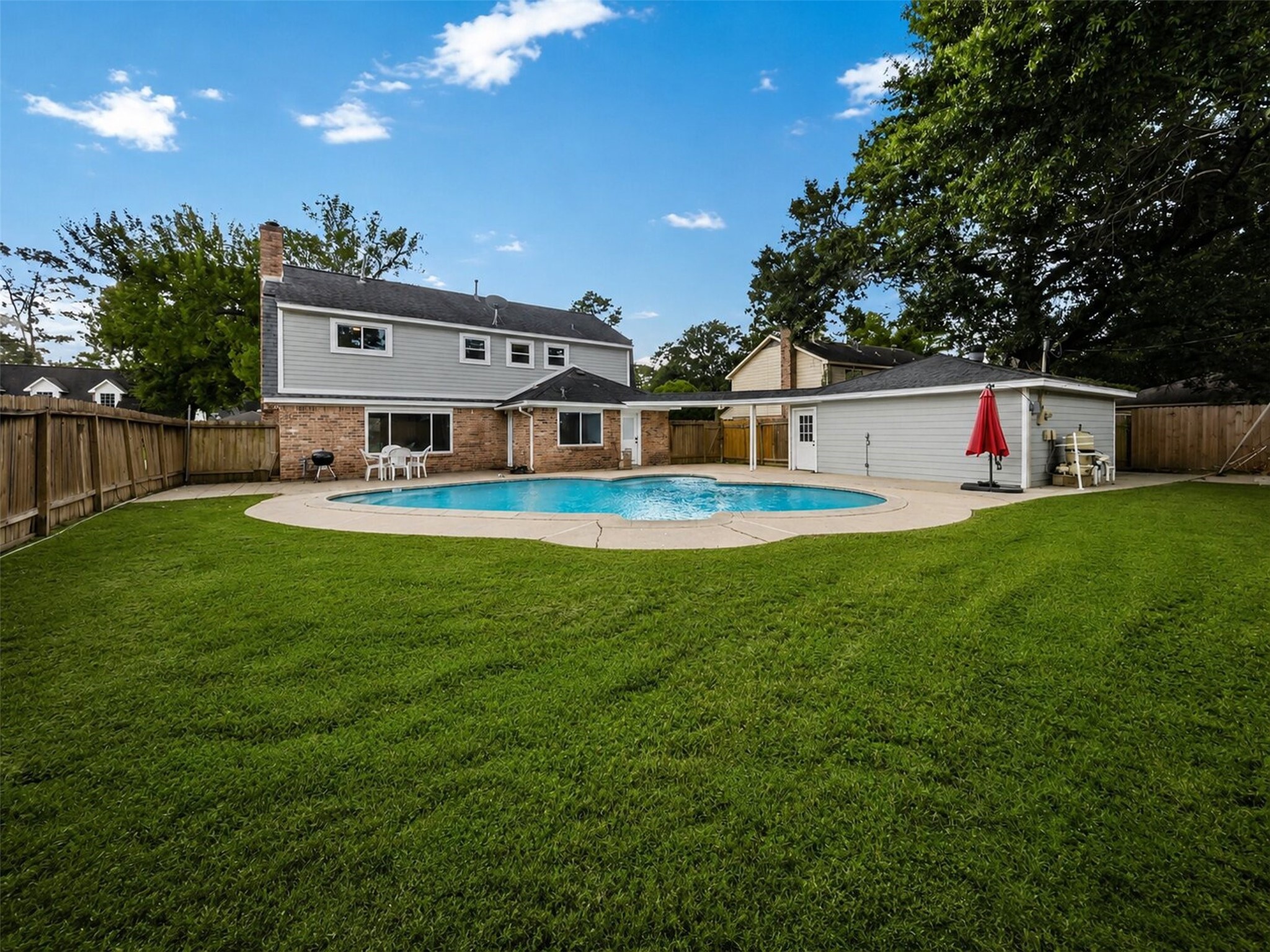 15414 Ripplestream Drive Houston, TX 77068 - Photo 36 of 41 Rear view of the house, backyard and pool!