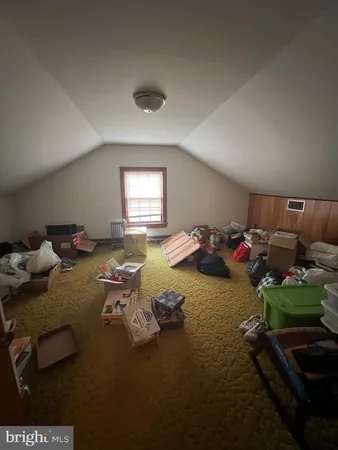 a view of a livingroom with wooden floor
