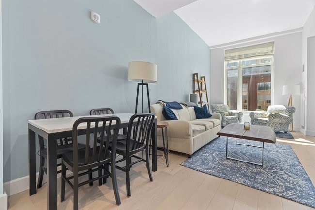 100 Lovejoy Place, Unit 12Q Boston, MA 02114 - Photo 2 of 13 a living room with furniture