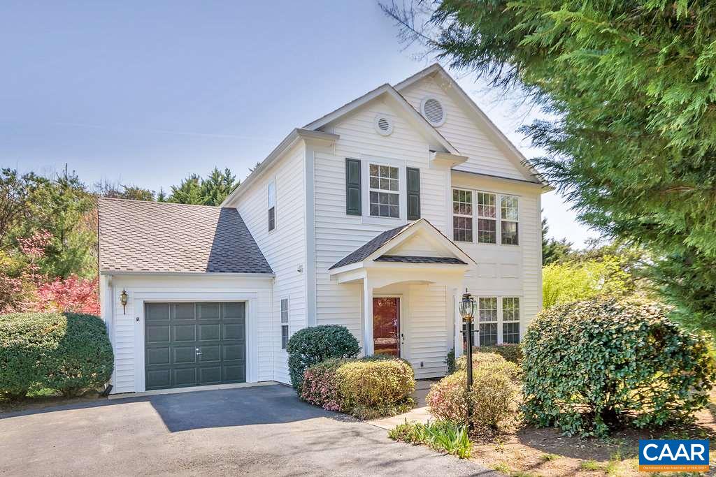 1641 Old Brook Road Charlottesville, VA 22901 - Photo 1 of 22 a front view of a house with a yard and garage