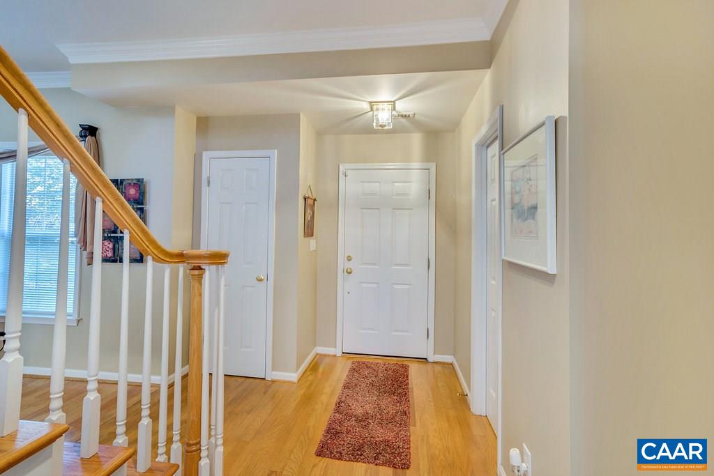 1641 Old Brook Road Charlottesville, VA 22901 - Photo 12 of 22 a view of entryway with wooden floor and stairs