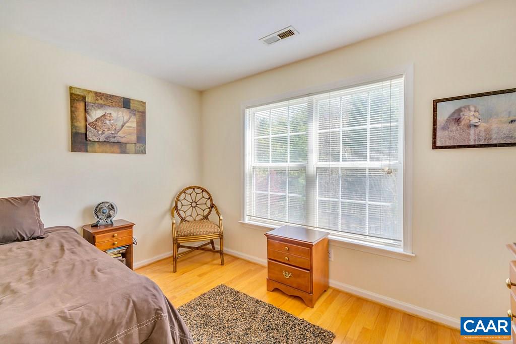 1641 Old Brook Road Charlottesville, VA 22901 - Photo 16 of 22 a bedroom with furniture and a window