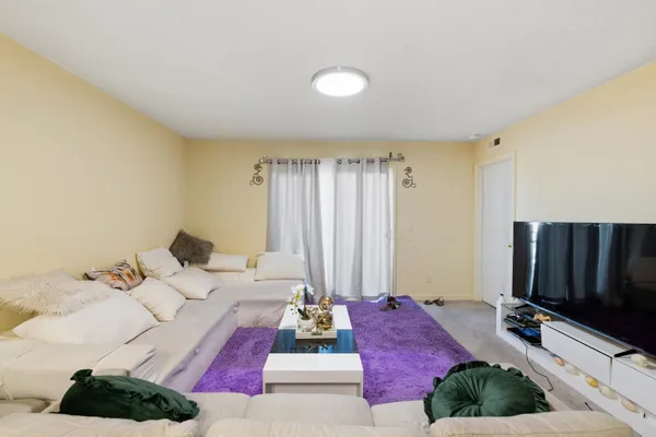 a living room with furniture and a couch