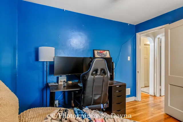 a view of a workspace with furniture