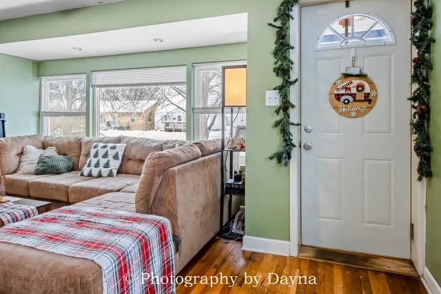 a bed room with two beds and a table