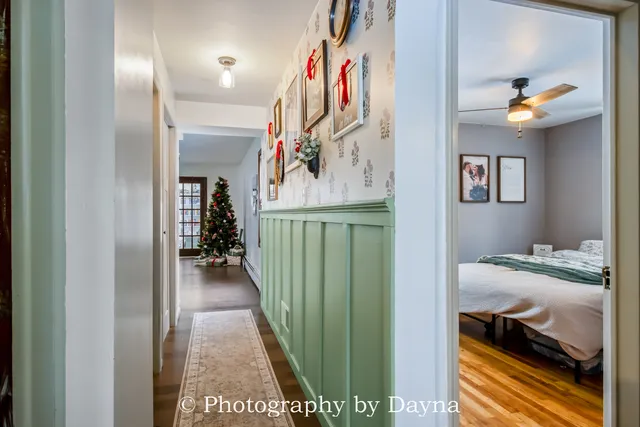 a bedroom with a bed and a book shelf