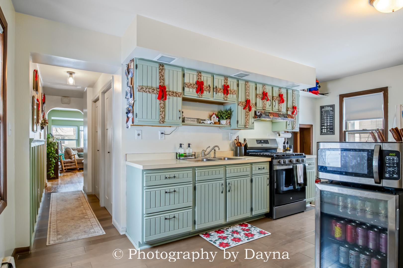 545 South Fraser Avenue Kankakee, IL 60901 - Photo 8 of 33 a open kitchen with cabinets a stove and a refrigerator