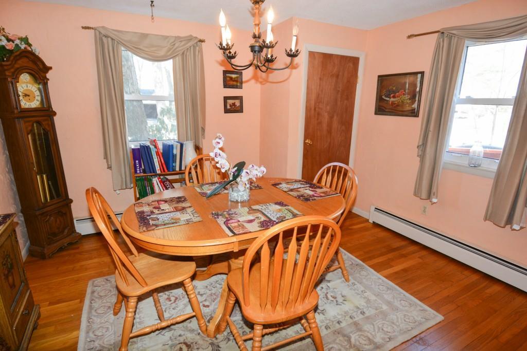 Formal dining room with hardwood floors