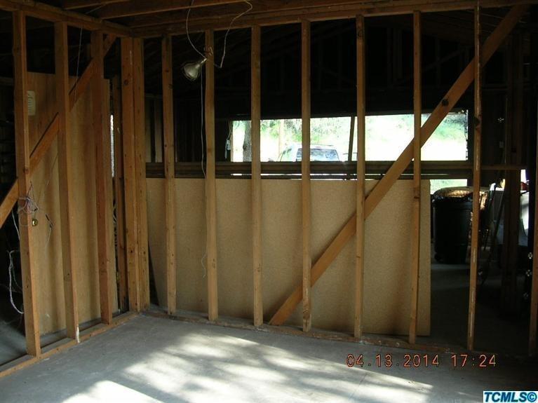 45485 Oak Grove Drive Three Rivers, CA 93271 - Photo 14 of 27 Bedroom 2 and wall with garage