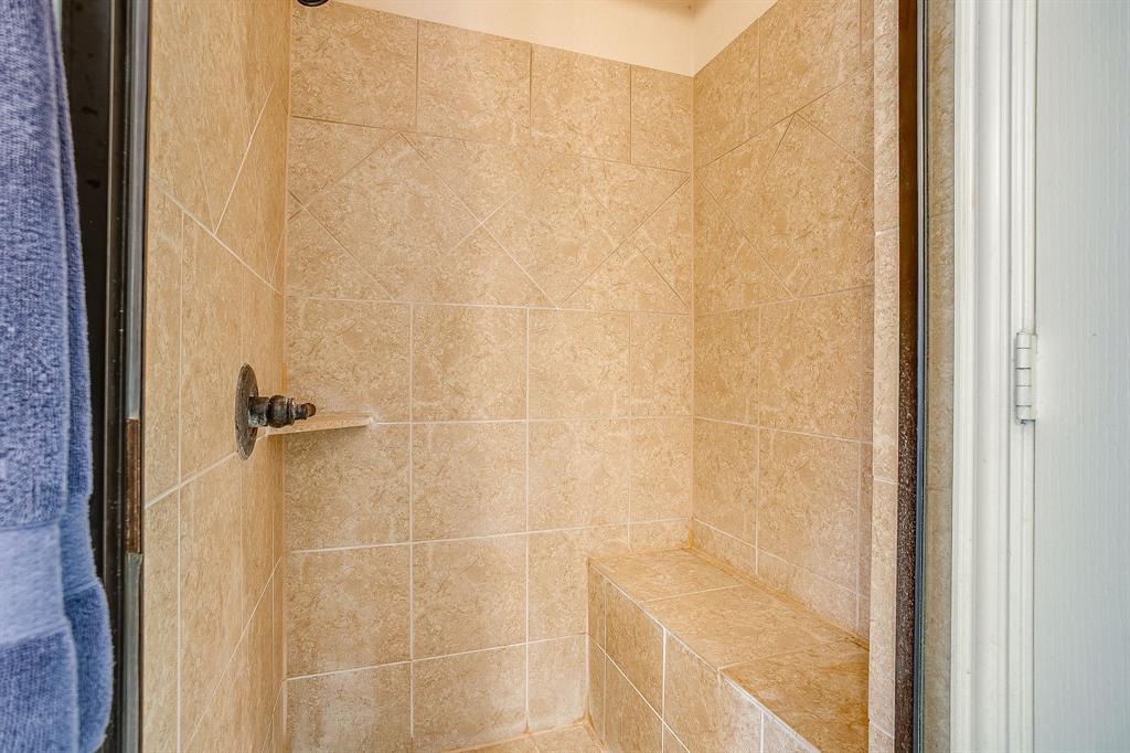 9815 Ravenswood Road Granbury, TX 76049 - Photo 26 of 40 a bathroom with a shower