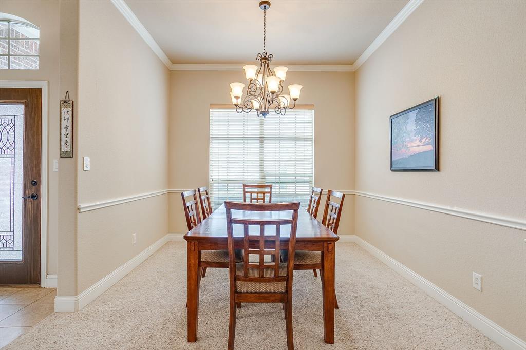 9815 Ravenswood Road Granbury, TX 76049 - Photo 6 of 40 a view of a dining room with furniture window and outside view