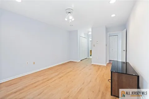 a bathroom with a double vanity sink and mirror