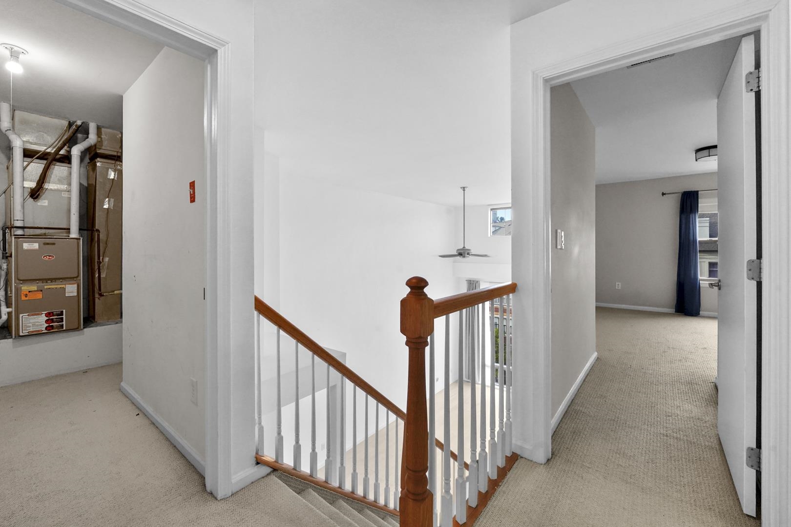 26 Ave At Port Imperial, Unit 440X West New York, NJ 07093 - Photo 12 of 36 a view of a hallway with a livingroom and stairs