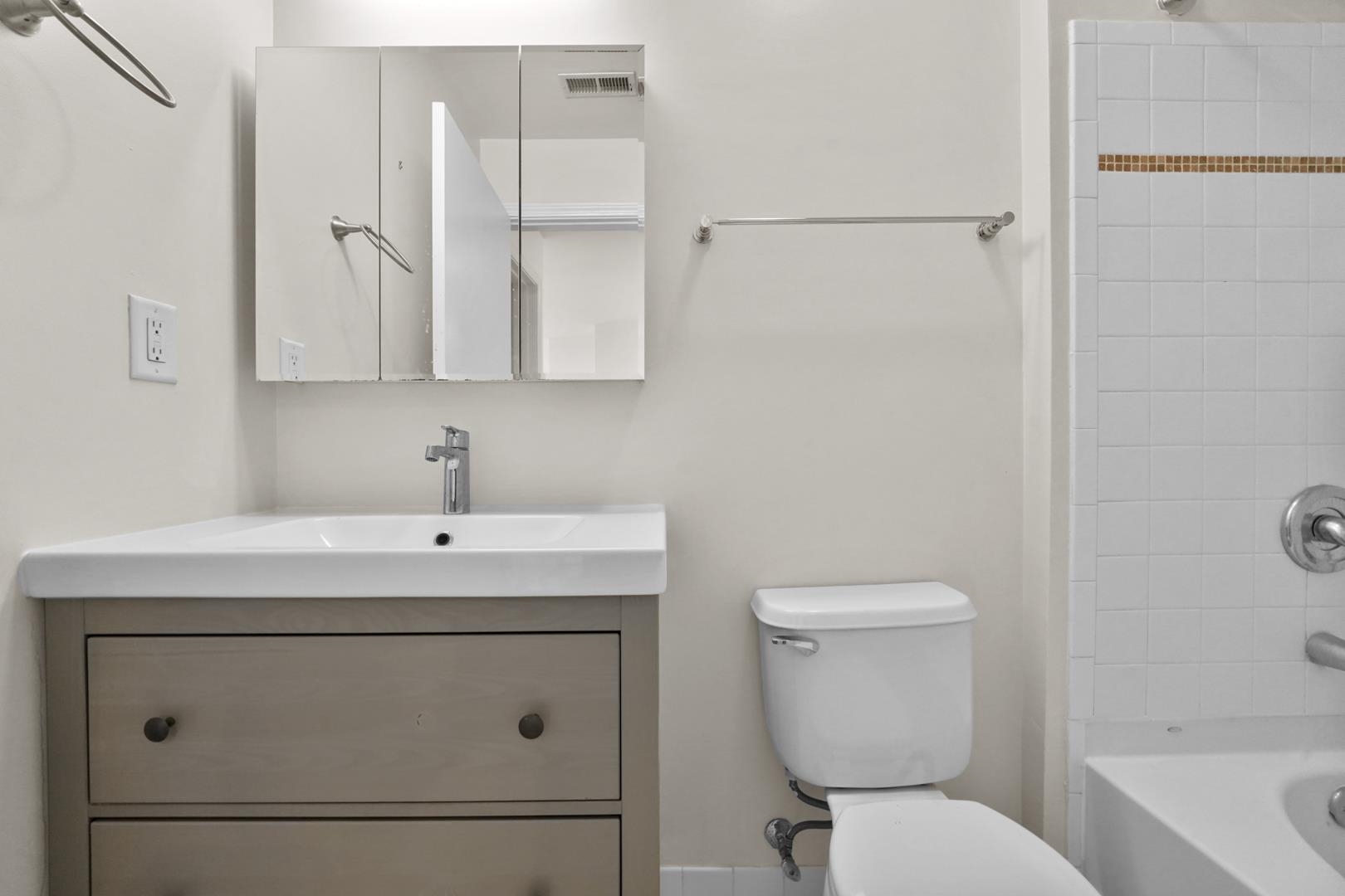 26 Ave At Port Imperial, Unit 440X West New York, NJ 07093 - Photo 14 of 36 a bathroom with a sink a toilet and shower