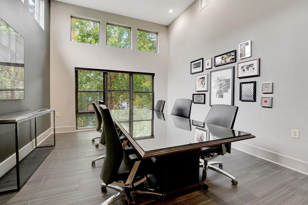 26 Ave At Port Imperial, Unit 440X West New York, NJ 07093 - Photo 19 of 36 a view of a workspace with furniture and a window