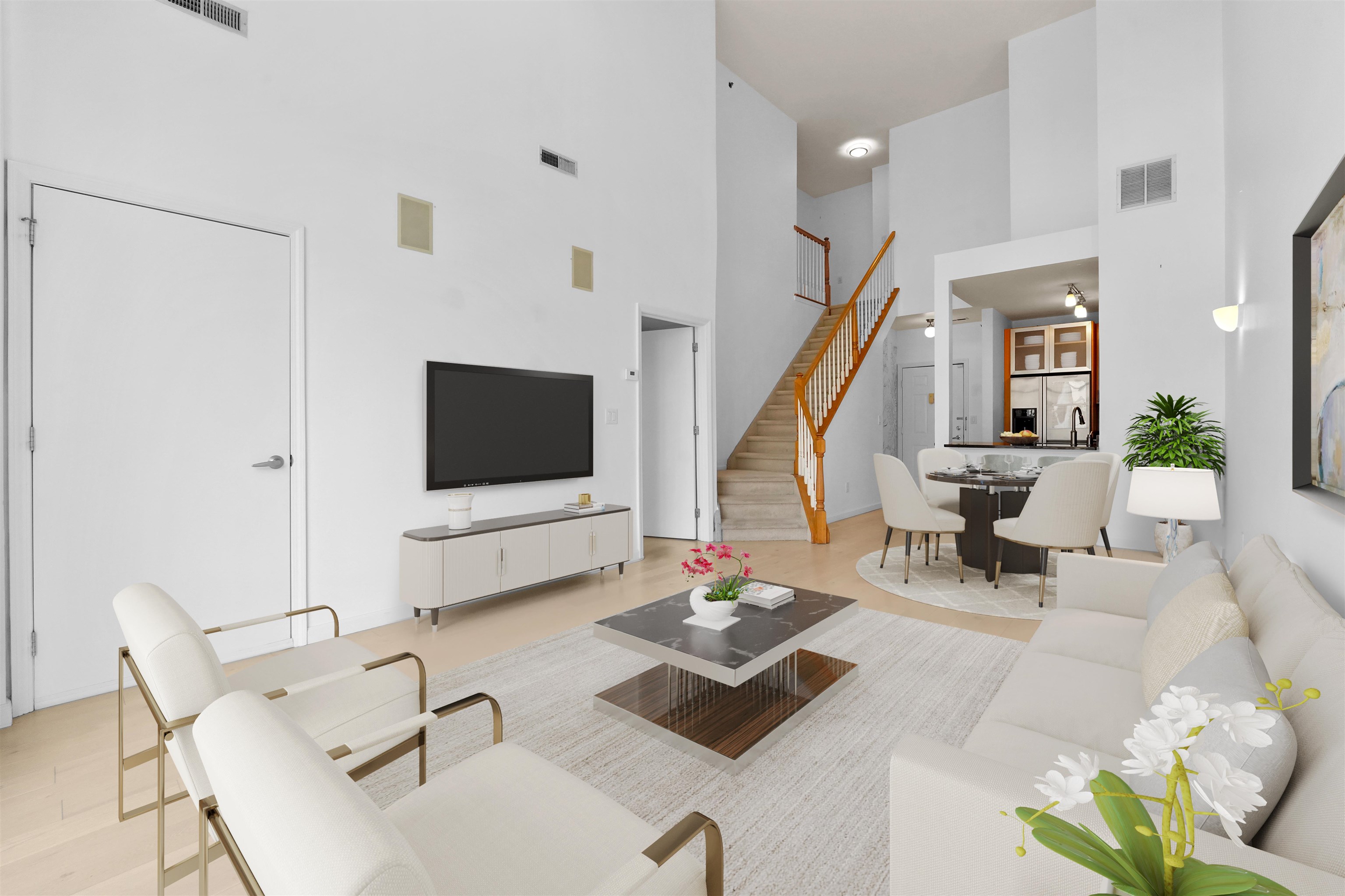 26 Ave At Port Imperial, Unit 440X West New York, NJ 07093 - Photo 2 of 36 a living room with furniture and a flat screen tv