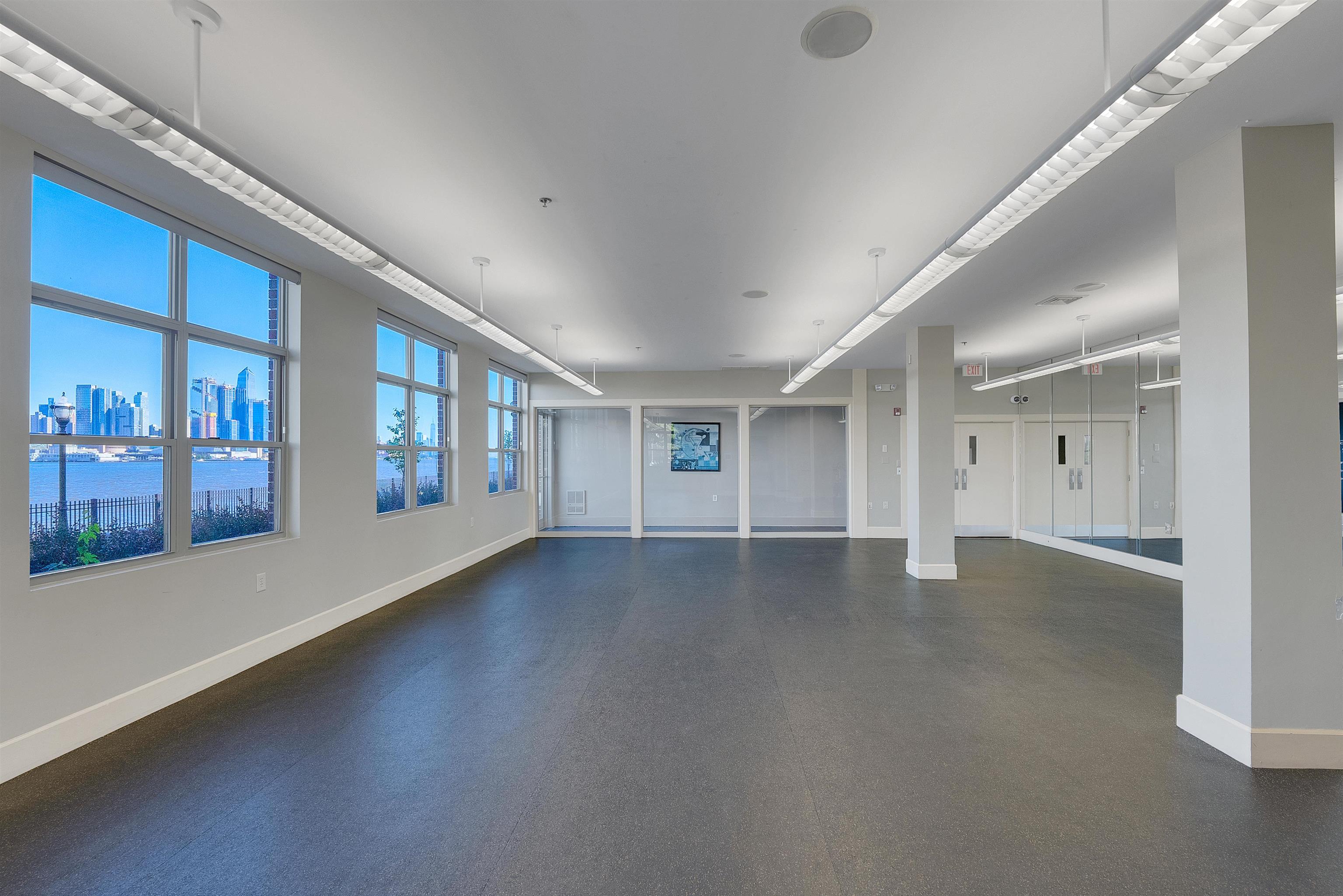 26 Ave At Port Imperial, Unit 440X West New York, NJ 07093 - Photo 26 of 36 wooden floor in an empty room with a window