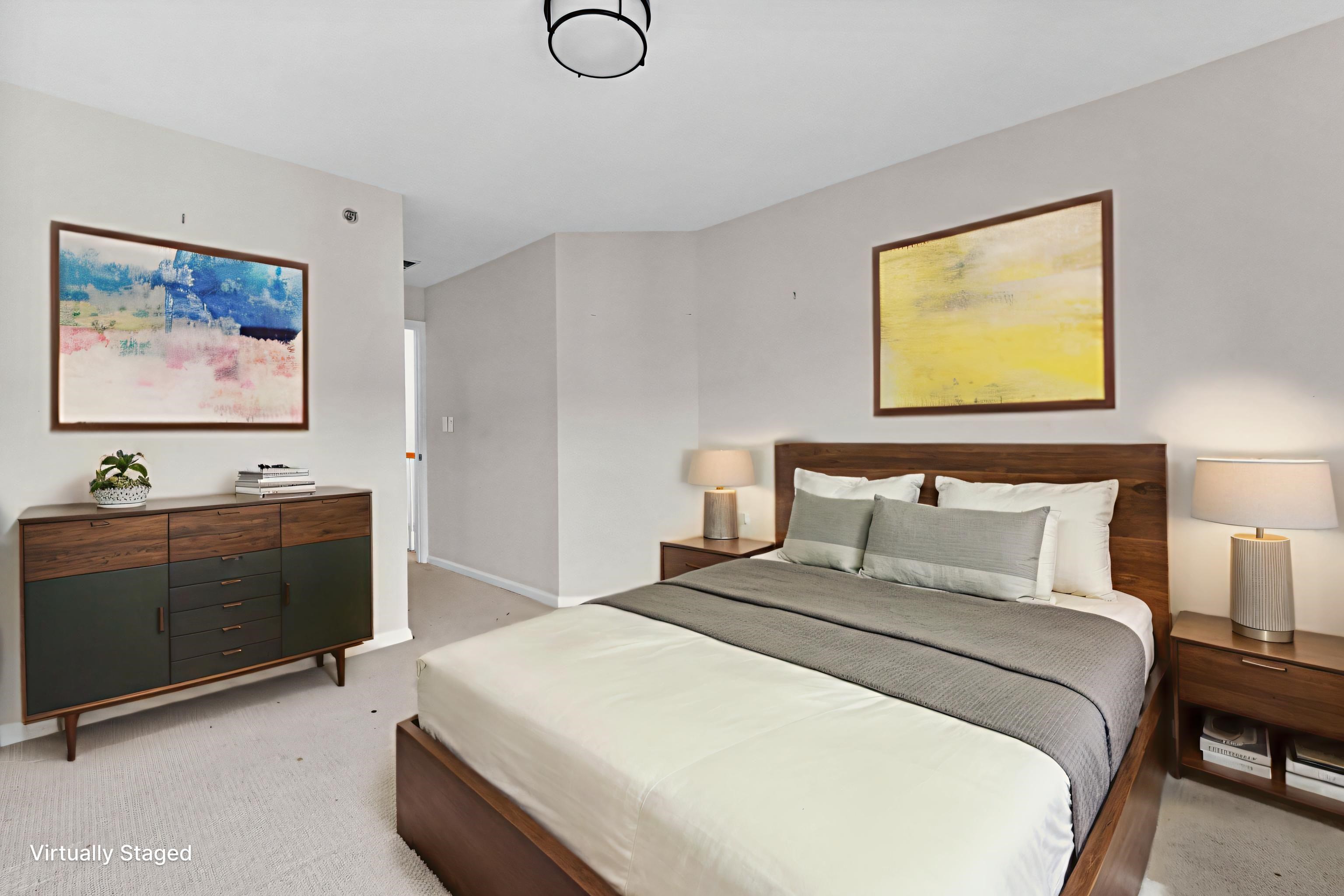 26 Ave At Port Imperial, Unit 440X West New York, NJ 07093 - Photo 8 of 36 a bedroom with a bed and a wall painting