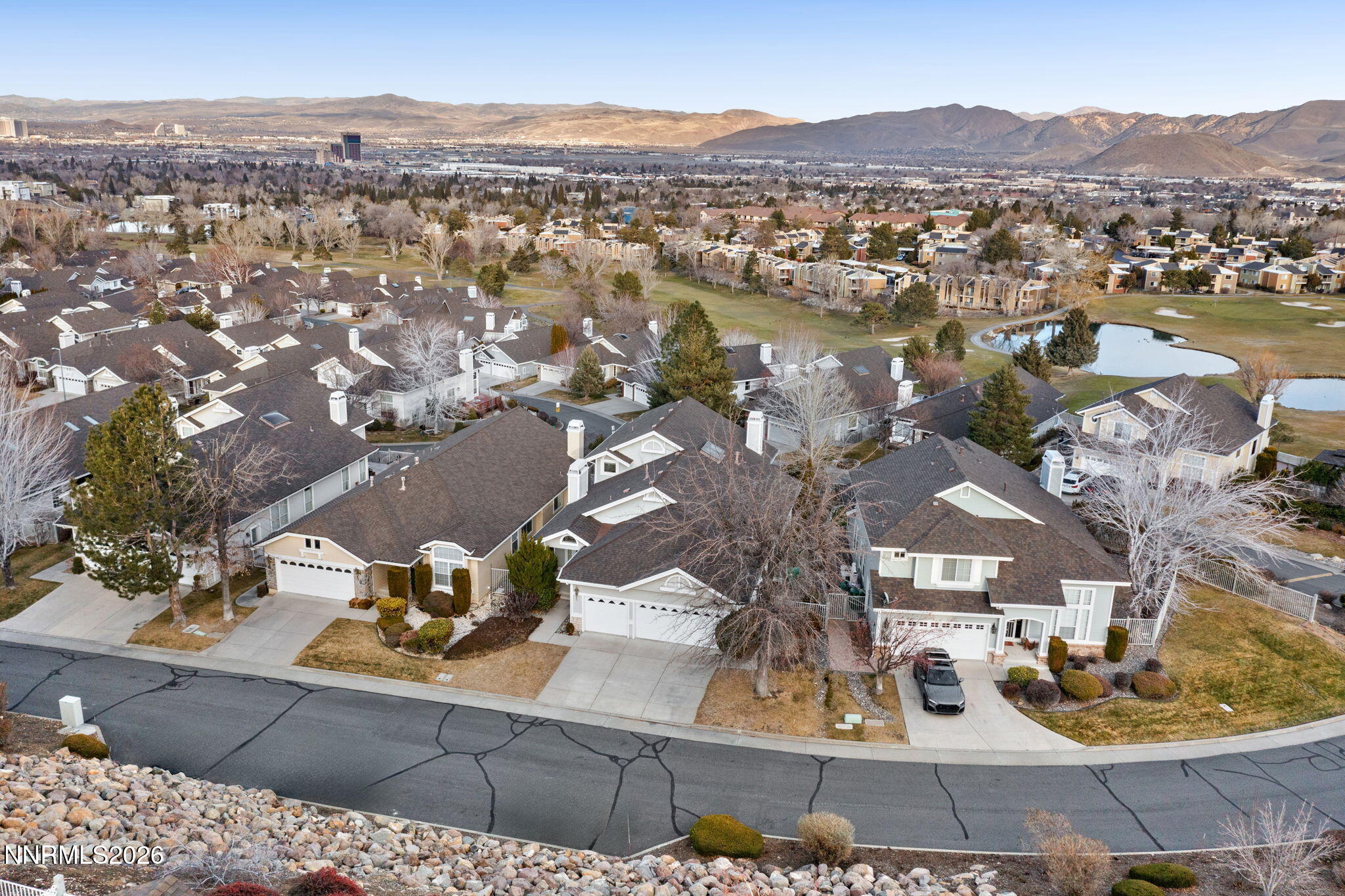 6186 Squires Lane Reno, NV 89519 - Photo 51 of 57 an aerial view of a house with a lake view