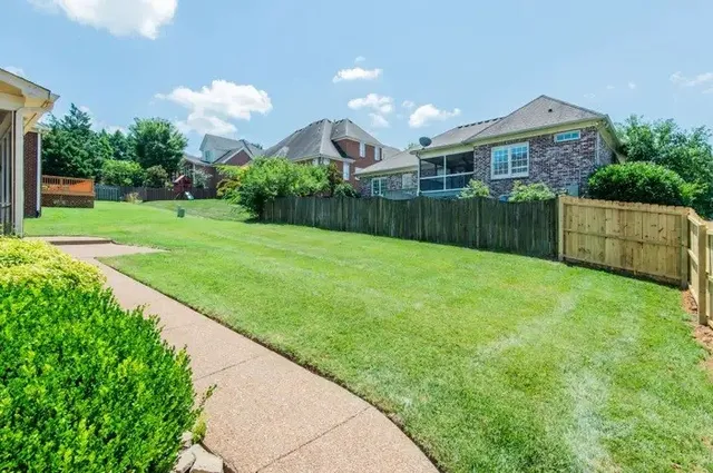 a view of lake with green space