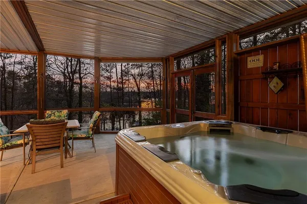 a view of trees and sitting area
