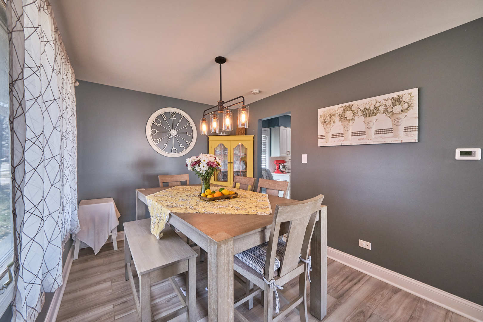 1115 Birch Road Homewood, IL 60430 - Photo 11 of 47 a view of a dining room with furniture and wooden floor