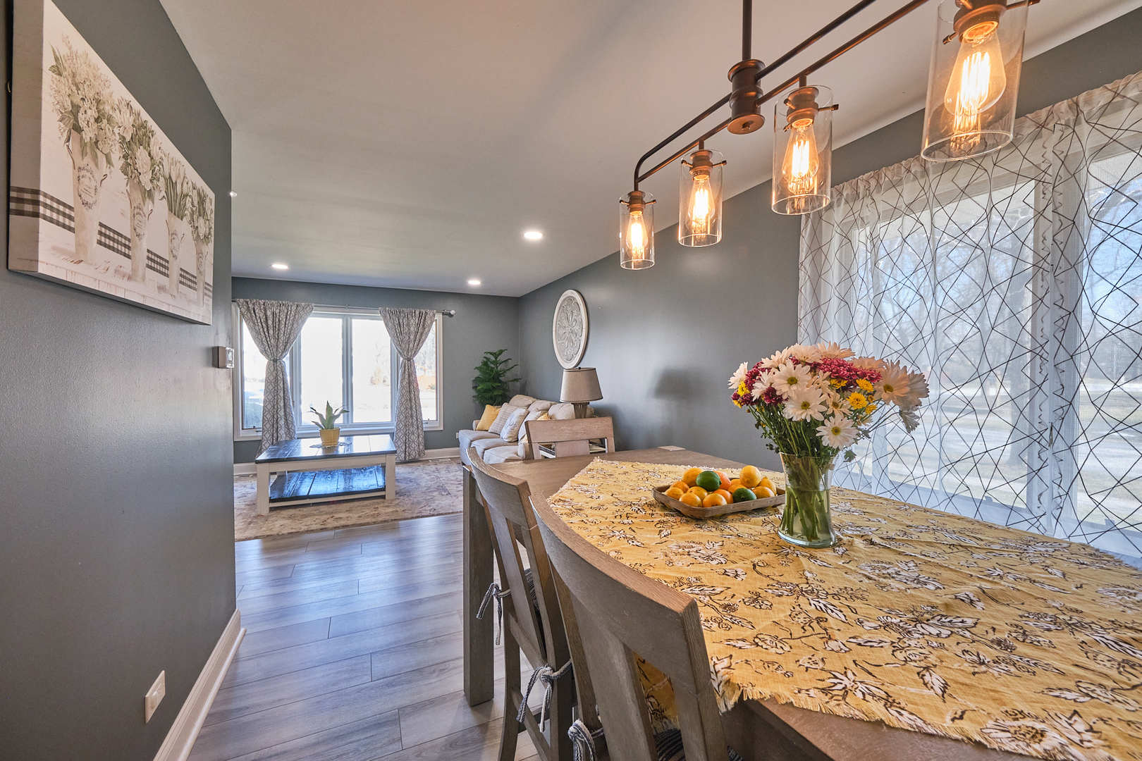 1115 Birch Road Homewood, IL 60430 - Photo 12 of 47 a dining room with furniture and wooden floor
