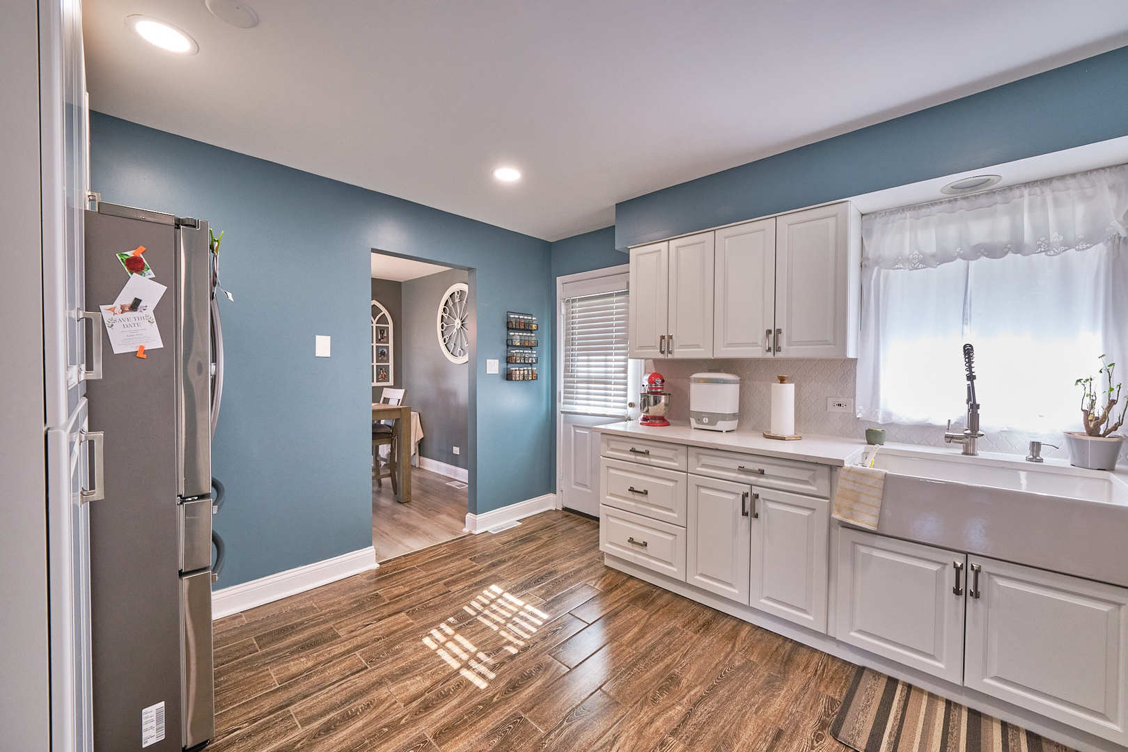 1115 Birch Road Homewood, IL 60430 - Photo 18 of 47 a kitchen with cabinets and wooden floor