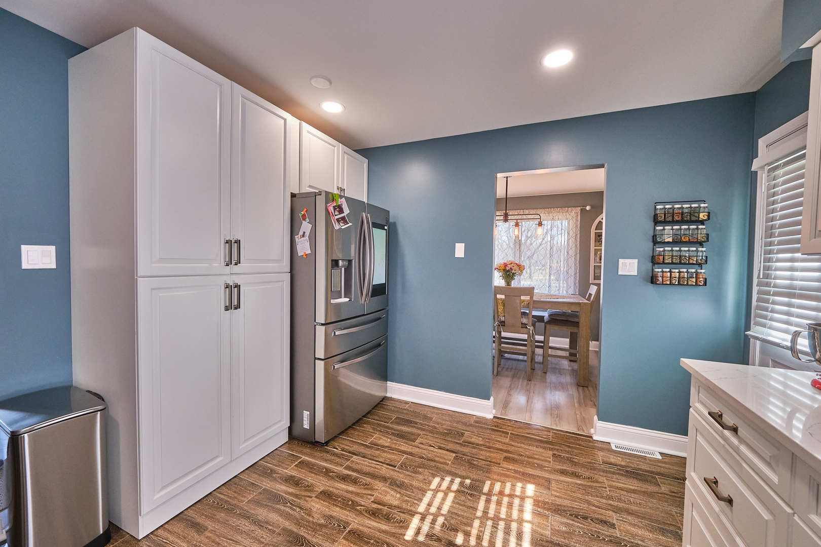 1115 Birch Road Homewood, IL 60430 - Photo 20 of 47 a view of a kitchen with furniture and wooden floor