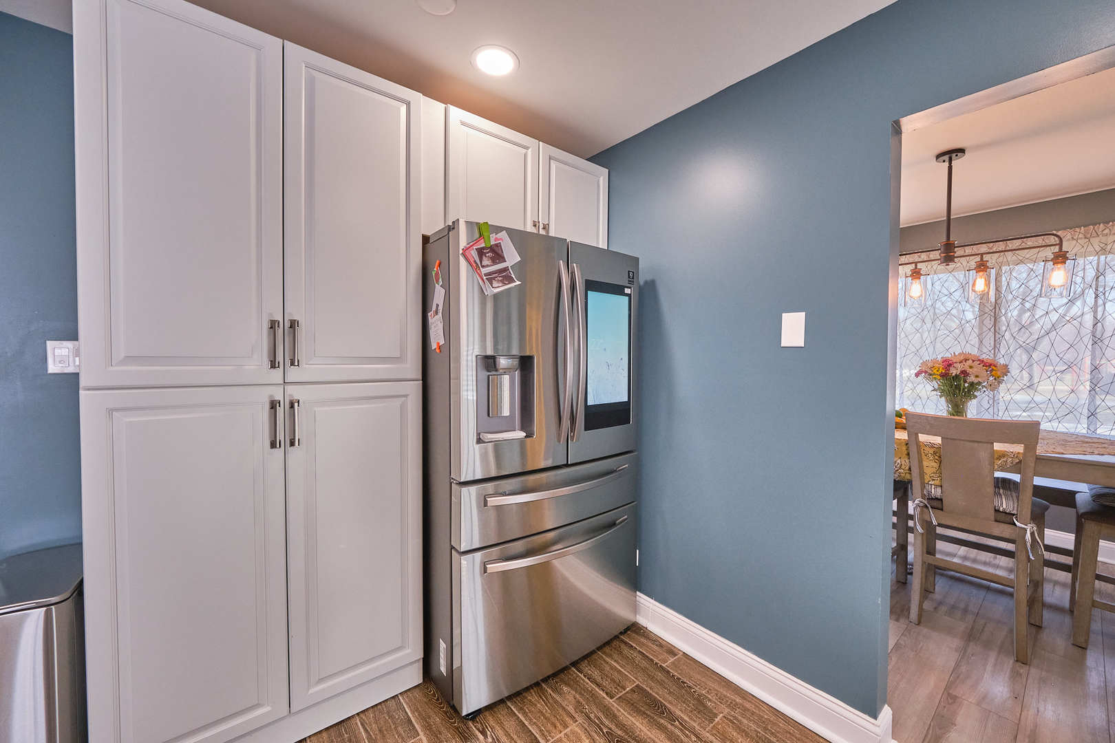 1115 Birch Road Homewood, IL 60430 - Photo 21 of 47 a kitchen with granite countertop a refrigerator and a stove top oven