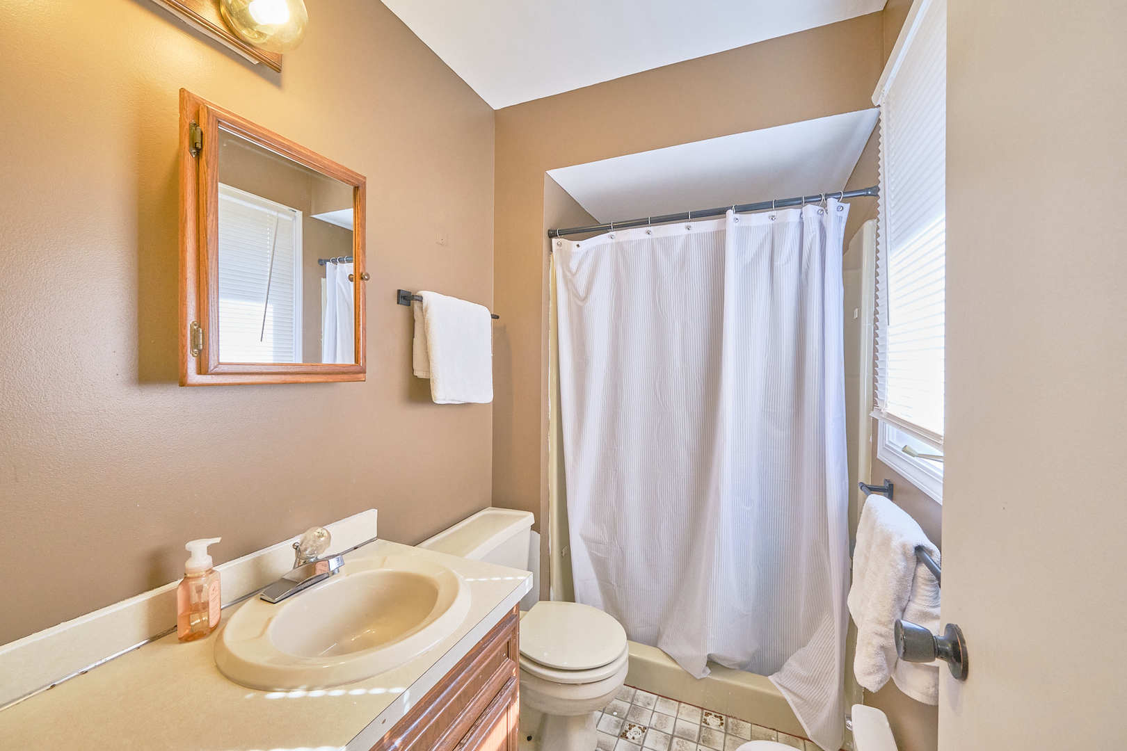 1115 Birch Road Homewood, IL 60430 - Photo 29 of 47 a bathroom with a sink toilet and shower