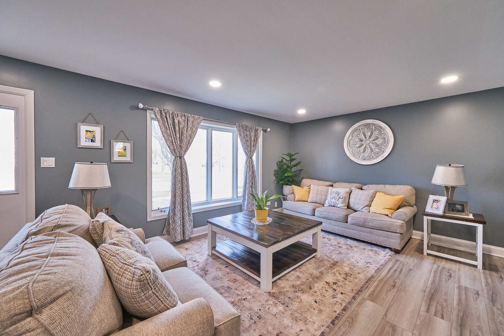 1115 Birch Road Homewood, IL 60430 - Photo 6 of 47 a living room with furniture and a large window