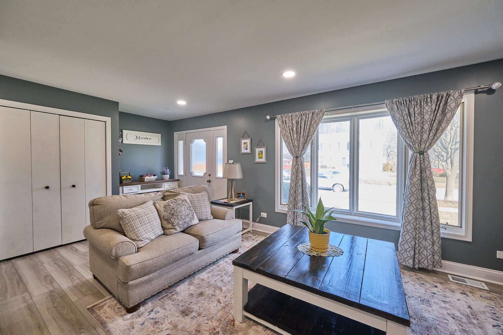 1115 Birch Road Homewood, IL 60430 - Photo 7 of 47 a living room with furniture and a potted plant
