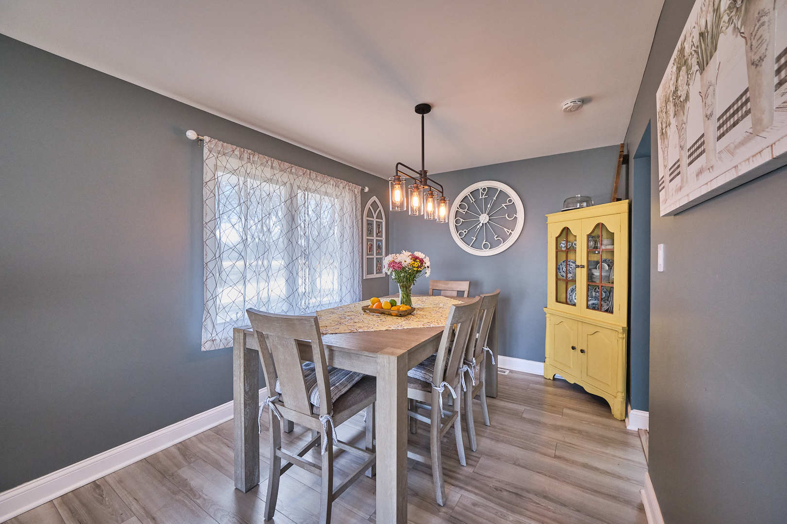 1115 Birch Road Homewood, IL 60430 - Photo 9 of 47 a view of a dining room with furniture window and wooden floor