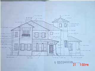 52 Rue Martine Miramar Beach, FL 32550 - Photo 1 of 1 a view of a brick house with white walls