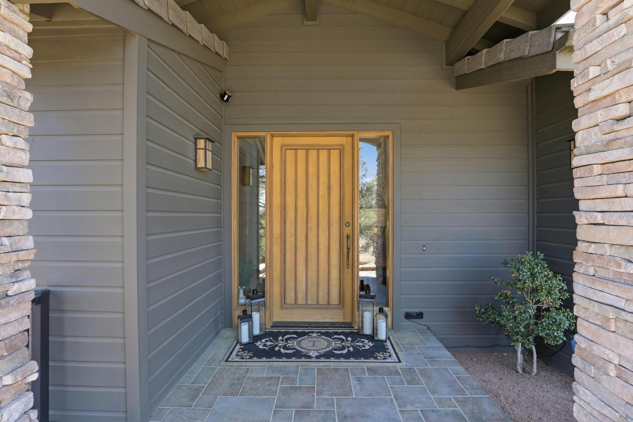 2908 East Rim Club Drive Payson, AZ 85541 - Photo 6 of 77 a view of a house with a door and chair