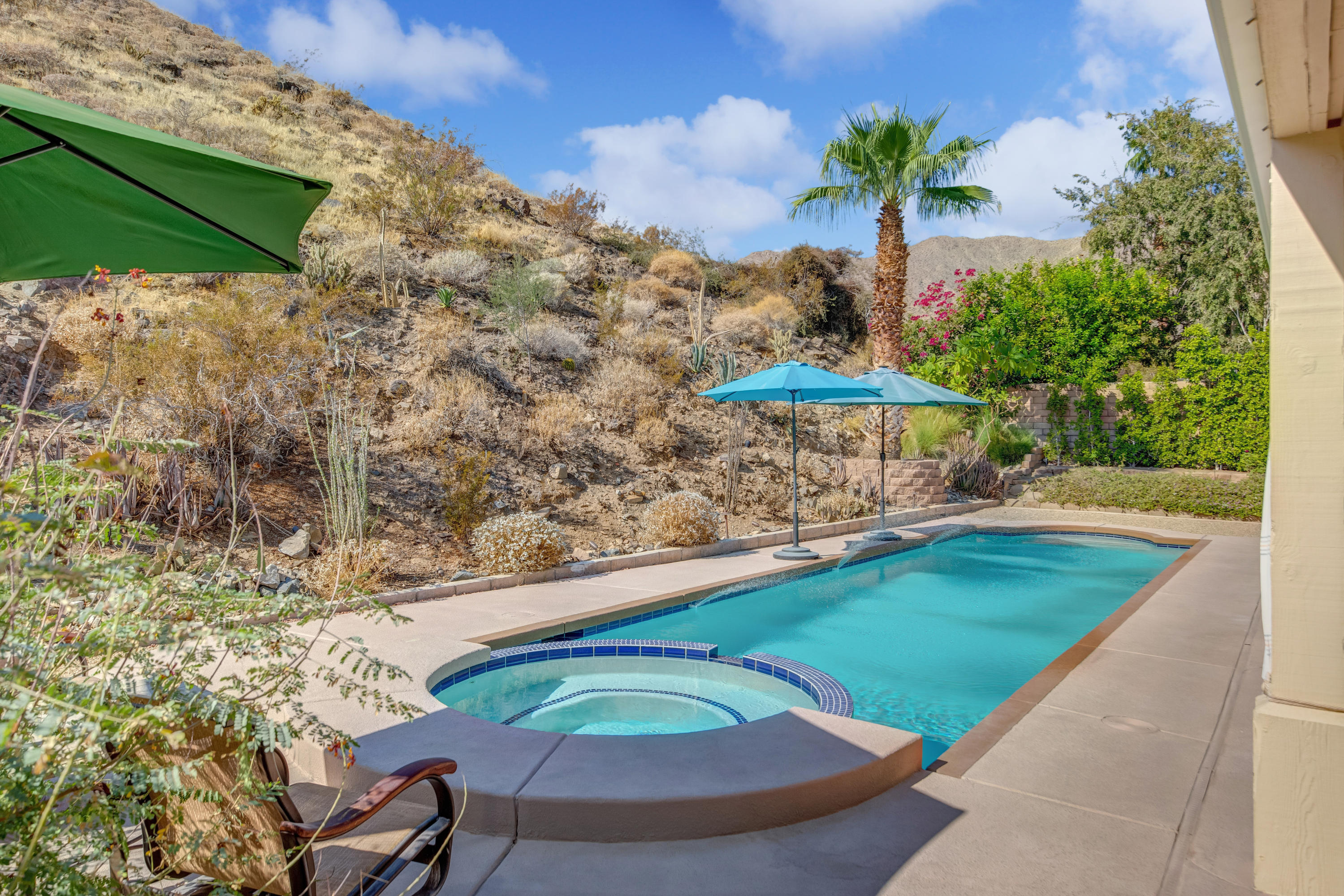 67825 Foothill Road Cathedral City, CA 92234 - Photo 1 of 48 a view of a backyard with a patio