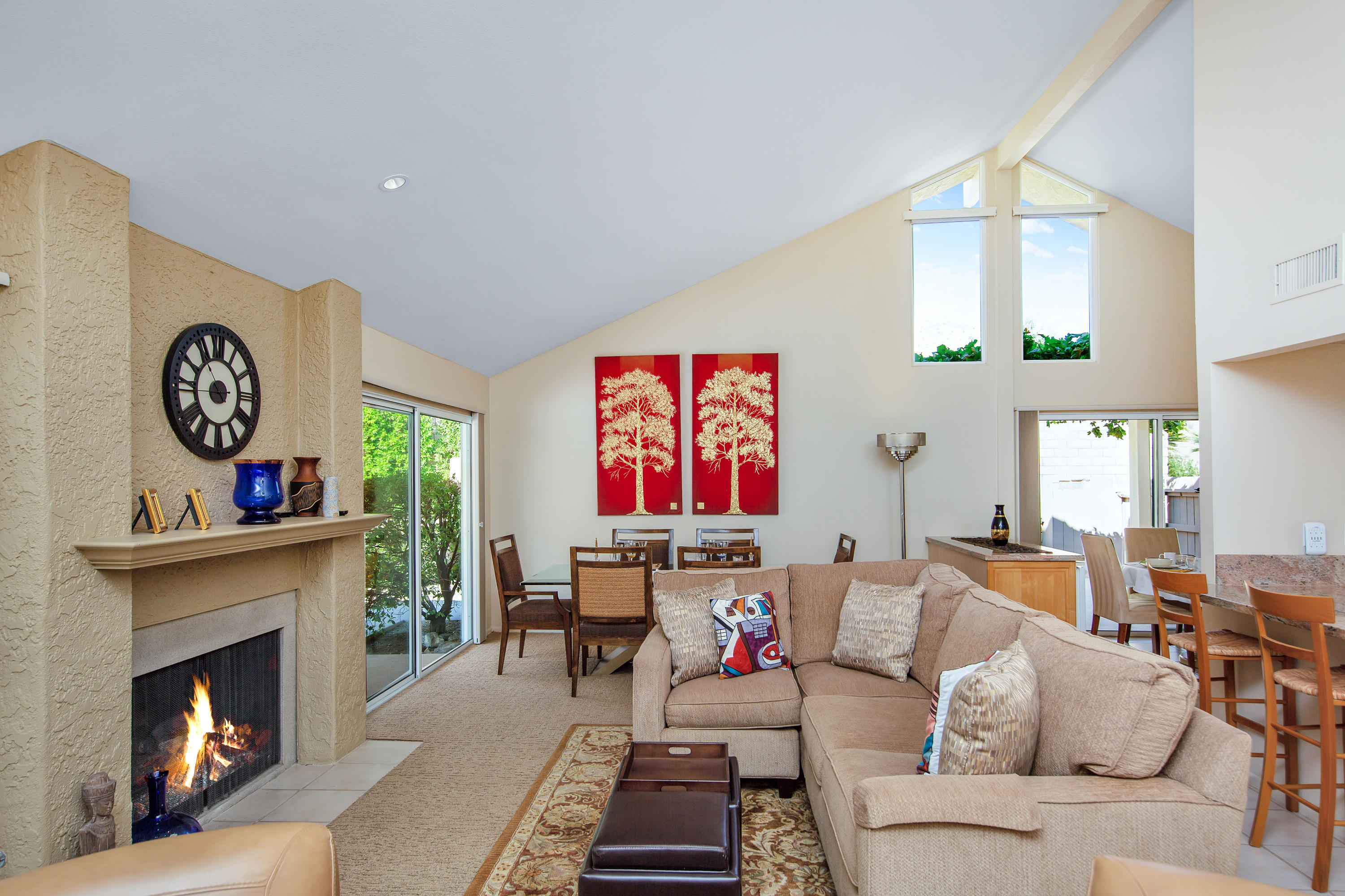 67825 Foothill Road Cathedral City, CA 92234 - Photo 9 of 48 a living room with furniture and a fireplace