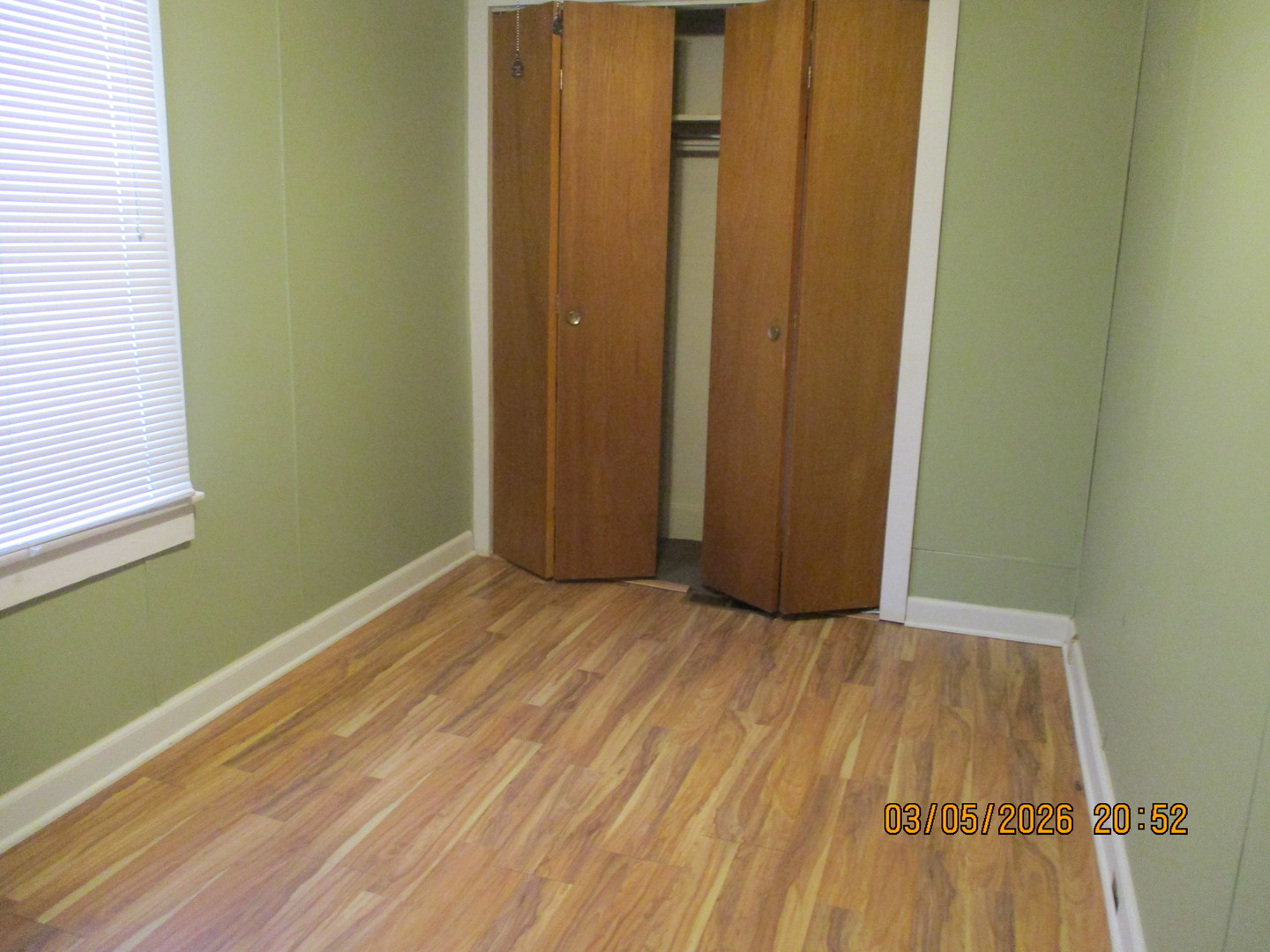 1412 13th Street Moline, IL 61265 - Photo 15 of 31 a view of a room with wooden floor and a window