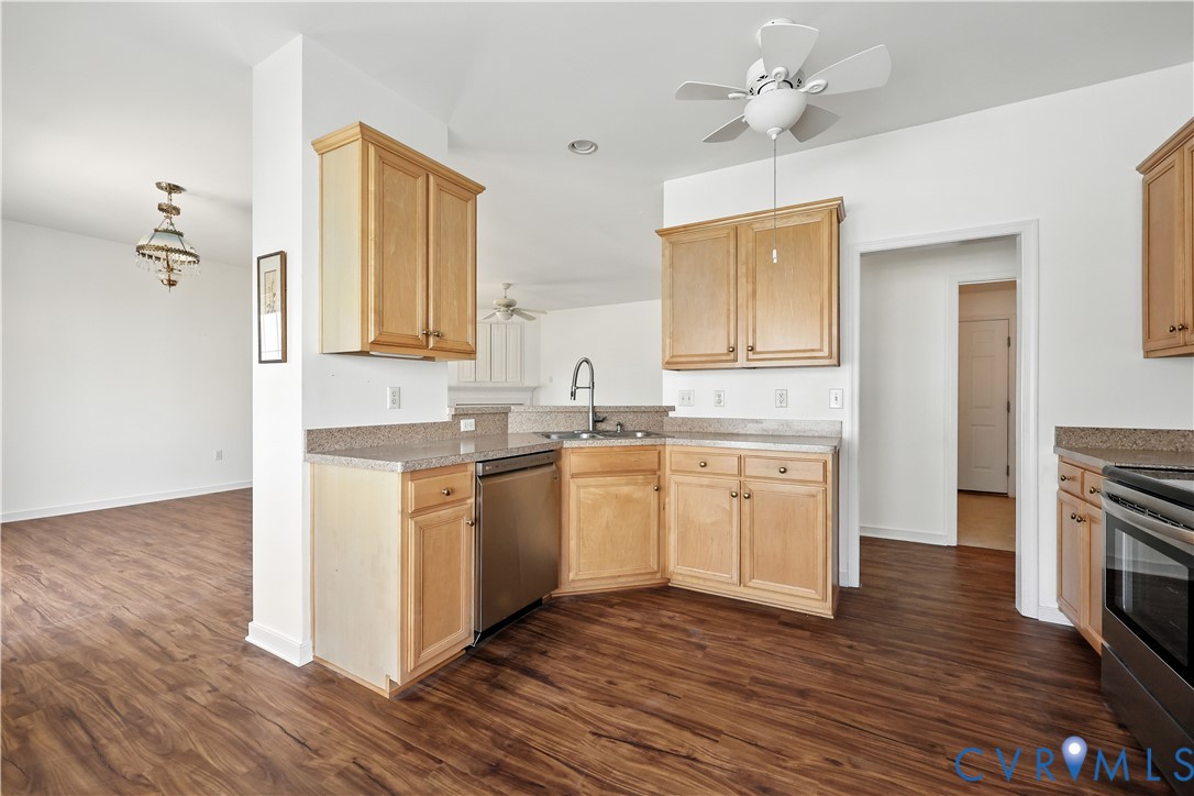 695 Krim Point Loop Midlothian, VA 23114 - Photo 16 of 29 Kitchen featuring light brown cabinetry, ceiling f