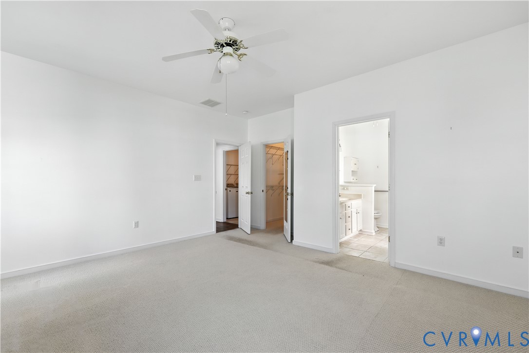 695 Krim Point Loop Midlothian, VA 23114 - Photo 19 of 29 Unfurnished bedroom with a spacious closet, light