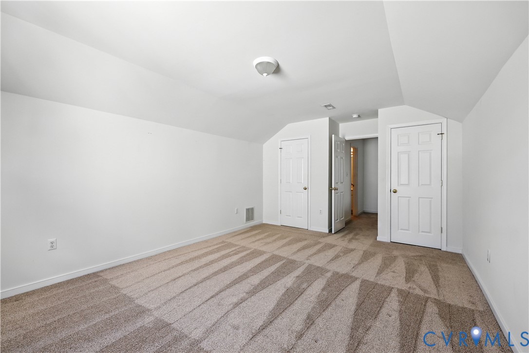 695 Krim Point Loop Midlothian, VA 23114 - Photo 24 of 29 Bonus room featuring carpet and lofted ceiling