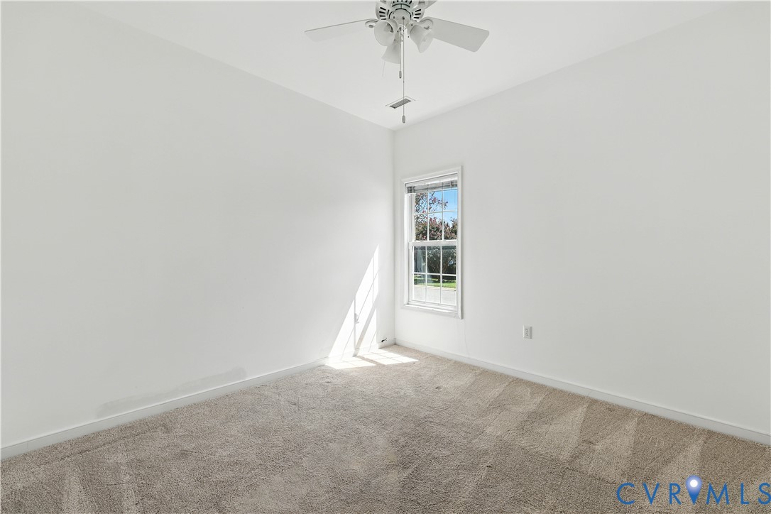 695 Krim Point Loop Midlothian, VA 23114 - Photo 9 of 29 Unfurnished room with carpet floors and ceiling fa